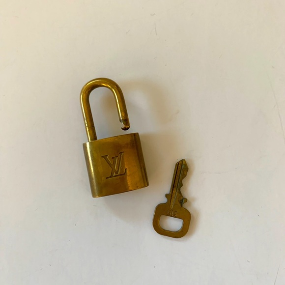 Authentic Louis Vuitton Gold Padlock with Key